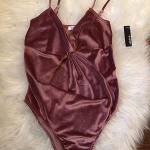 pink velvety bodysuit never worn